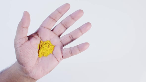 Turmeric Yellow In Hand
