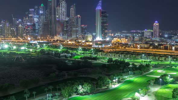 Dubai Marina Skyscrapers and Golf Course Night Timelapse Dubai United Arab Emirates