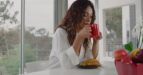 Woman Drinking Her Morning Coffee