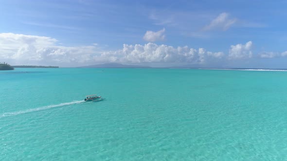 A boat in a tropical lagoon in Bora Bora tropical island