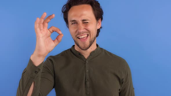 Goodlooking Bearded Guy in Khaki Colored Shirt