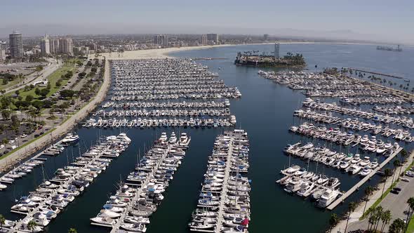 This is a drone flight over the boat harbor in Long Beach California