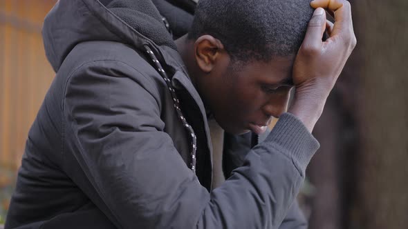 Desperate upset Young american African Man .job Loss,depression