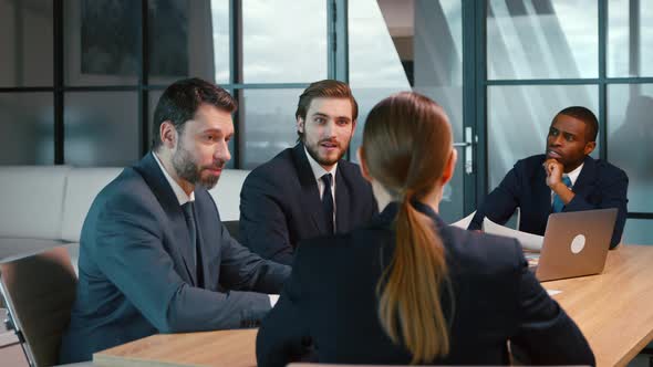 Business people discussing a new project. Group of people at a business meeting