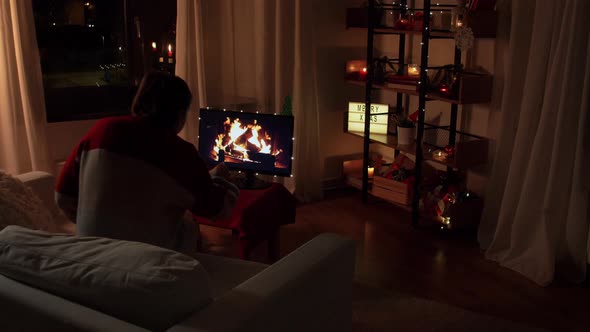 Woman Drinking Coffee at Home on Christmas