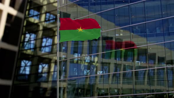 Burkina Faso Flag Waving On A Skyscraper Building