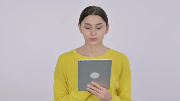 Spanish Woman using Tablet on White Background