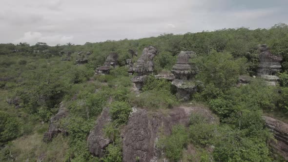 Ancient Rock Arts On Tabletop Mountains In The Amazonian Jungle In Colombia. aerial drone orbit