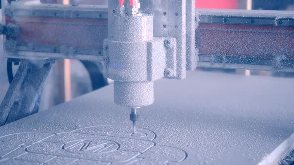 Milling Machine Carves the Form on a White Surface Closeup