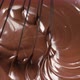 Melted chocolate. Mixing liquid chocolate with whisk. Liquid hot chocolate swirl - VideoHive Item for Sale