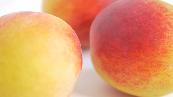 Peaches juicy fruit close-up  UHD 4k 2160p footage  - Peach on white background 4K 3840X2160 UHD fru