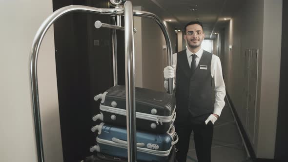 Portrait of Porter in Hotel Corridor