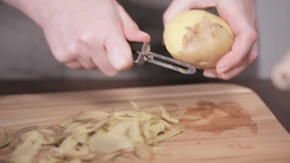 Step by step. Peeling Yukon gold potatoes for creamy mashed potatoes.