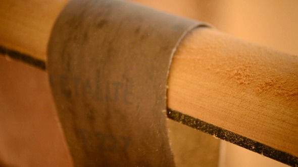 Sanding the Mast of a Guitar