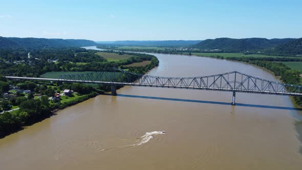 Carl Perkins Bridge crossing the Ohio River from Kentucky, aerial drone footage