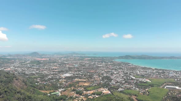 Top wide view over Mueang Phuket District urbanised tropical landscape in Phuket, Thailand 