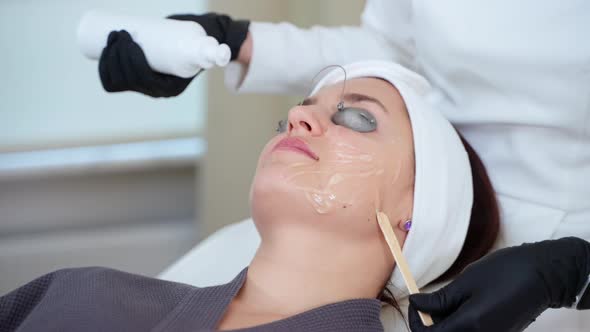 Applying Facial Gel Before Laser Procedure