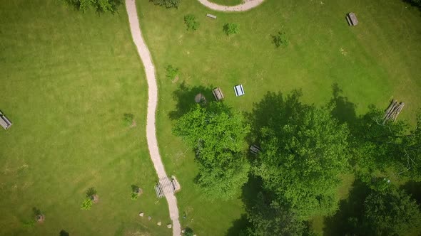 Drone flying over a beautiful and lush park.