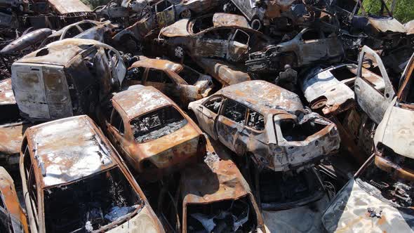 Consequences of the War in Ukraine  a Dump of Shot and Burned Cars in the City of Irpen Near Kyiv