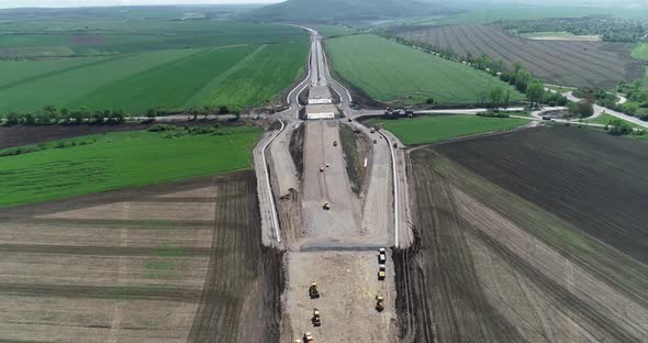 Aerial view of highway construction site. Overpass, highway intersection.