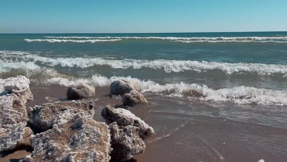 Rocks being pushed by the waves in Lake Michigan