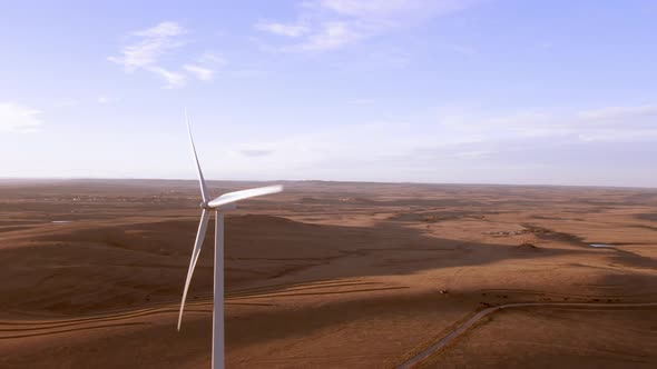 Aerial shots of a wind farm near Calhan in Colorado around sunset