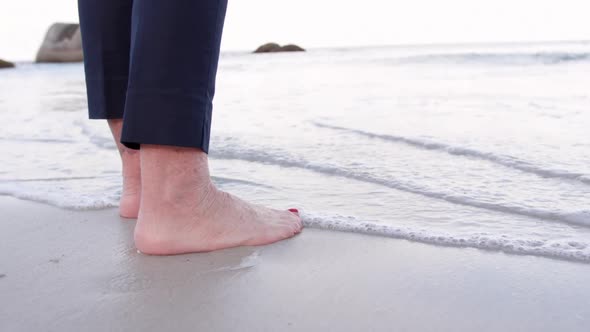 Woman standing at beach 4k