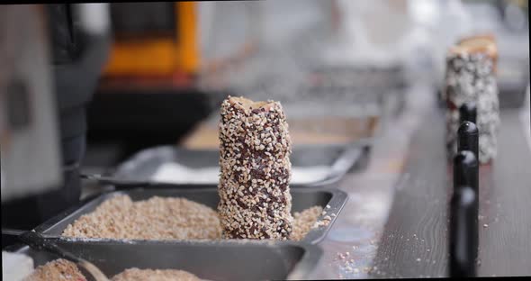 Preparing Trdelnik a Traditional Chech Street Food