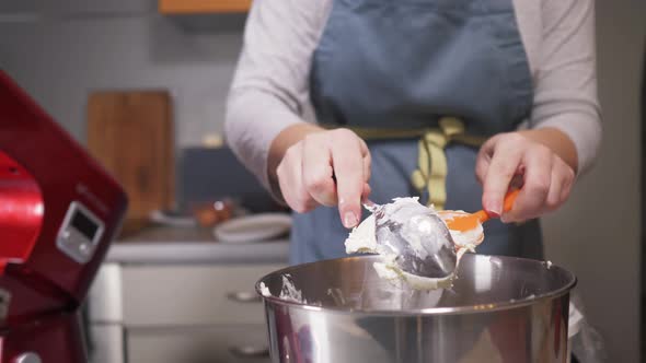 The Pastry Chef Puts the Creamy Curd Cheese in the Bowl of the Planetary Mixer