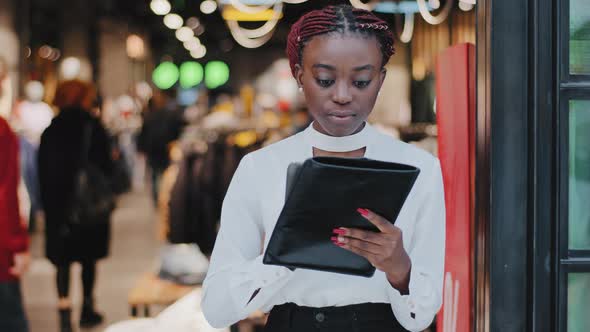 Serious Focused Young African American Girl Salesman Female Worker Busy Woman Clothing Store Owner