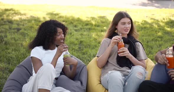 Multi Ethnic Students Having Lunch at Park