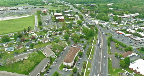 Aerial View of Main Road That Connects Small Towns in Suburb Area