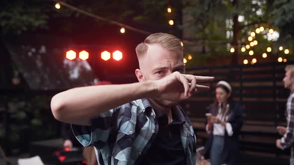 Handsome Bearded Young Man in Stylish Shirt Rythmic Dancing 