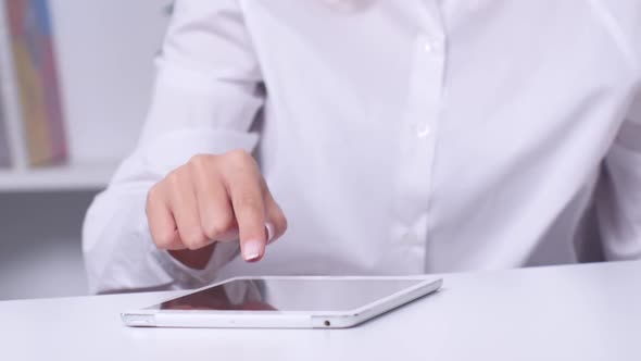 Woman Keeps Three Credit Cards and Completes Online Shopping. Close Up