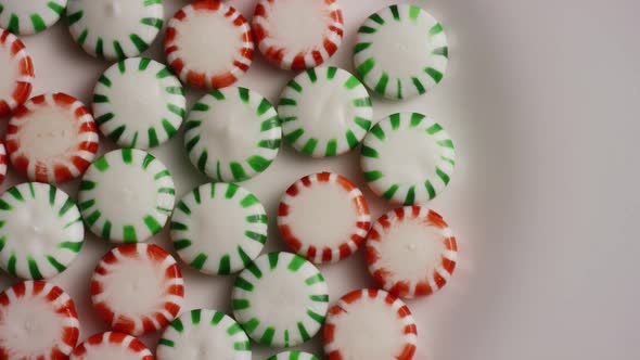 Rotating shot of spearmint hard candies - CANDY SPEARMINT 059