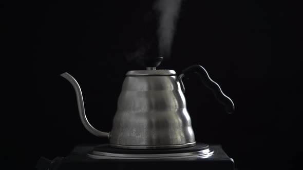 Gooseneck coffee kettle with boiling water
