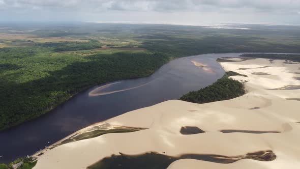 Sand dunes mountains and rain water lagoons at northeast brazilian paradise.