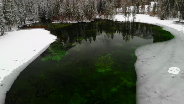 Beautiful view on an frozen Lake in Schiederweiher in Upper Austria Drone Video