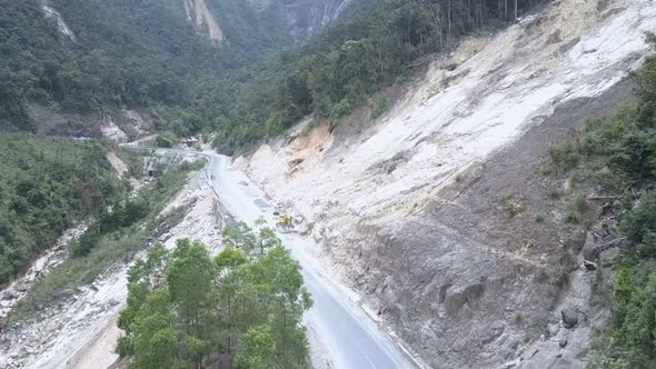 Beautiful Terrible View of Deep Ravine with Road Landslides