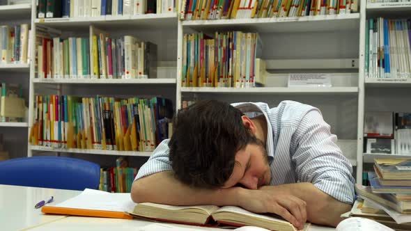Guy Sleeps at the Library