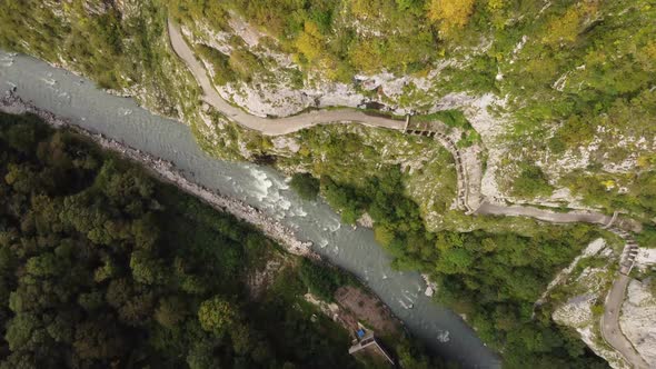 Aerial view from a drone on a road in the mountains.