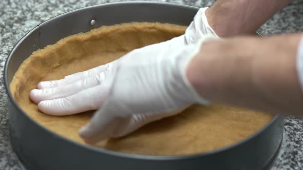 Chef Hands Pressing Pie Crust