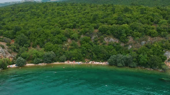 Aerial shot of Macedonia coast. Clif and beautiful water around Ohrid Lake in Southern Europe with v