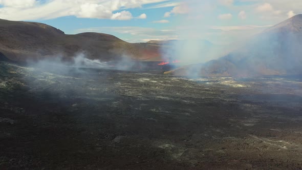 Fagradalsfjall Iceland Volcano Eruption. Volcanic Plain Scenery Covered in White Smoke Rising