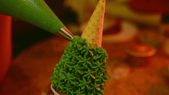 Unrecognizable Woman Holds Small Cupcake with Waffle Cone