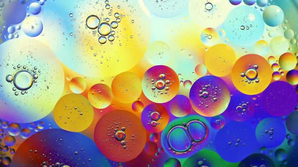 Oil Drops On A Water Surface Abstract Background