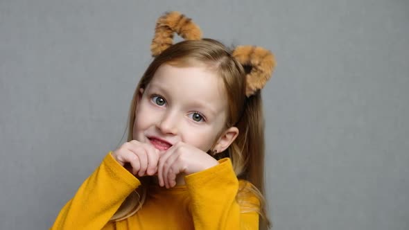 Cute Smiling Blond Girl with Tiger Ears