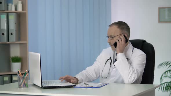 General Practitioner Giving Online and Phone Consultations, Servicing Patients