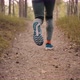 Man Runs Along Narrow Path in Old Pine Forest Back View - VideoHive Item for Sale