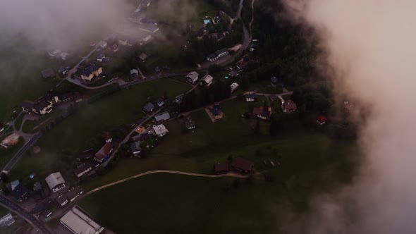 Panoramic View of a Picturesque Mountain Valley with a Village in a Lowland